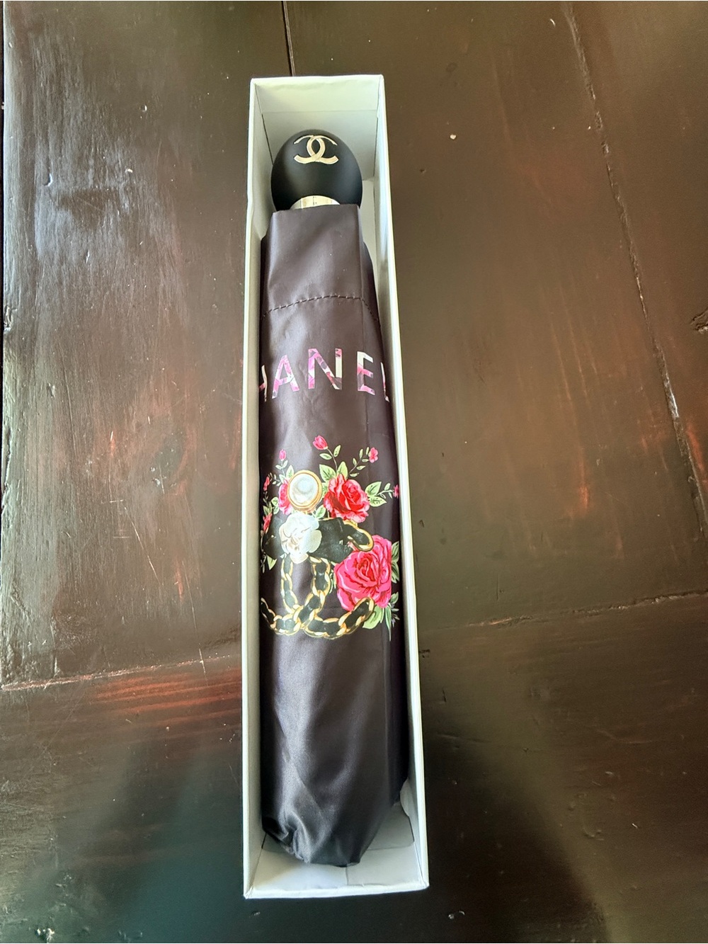 Chanel Floral Patterned NIB
CC luxe Umbrella - Black/pink. - Picture 8 of 9